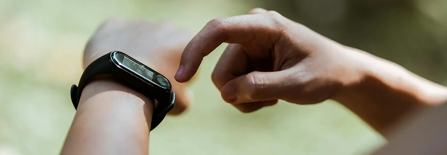 product photography of smartwatch being tapped to check notifications