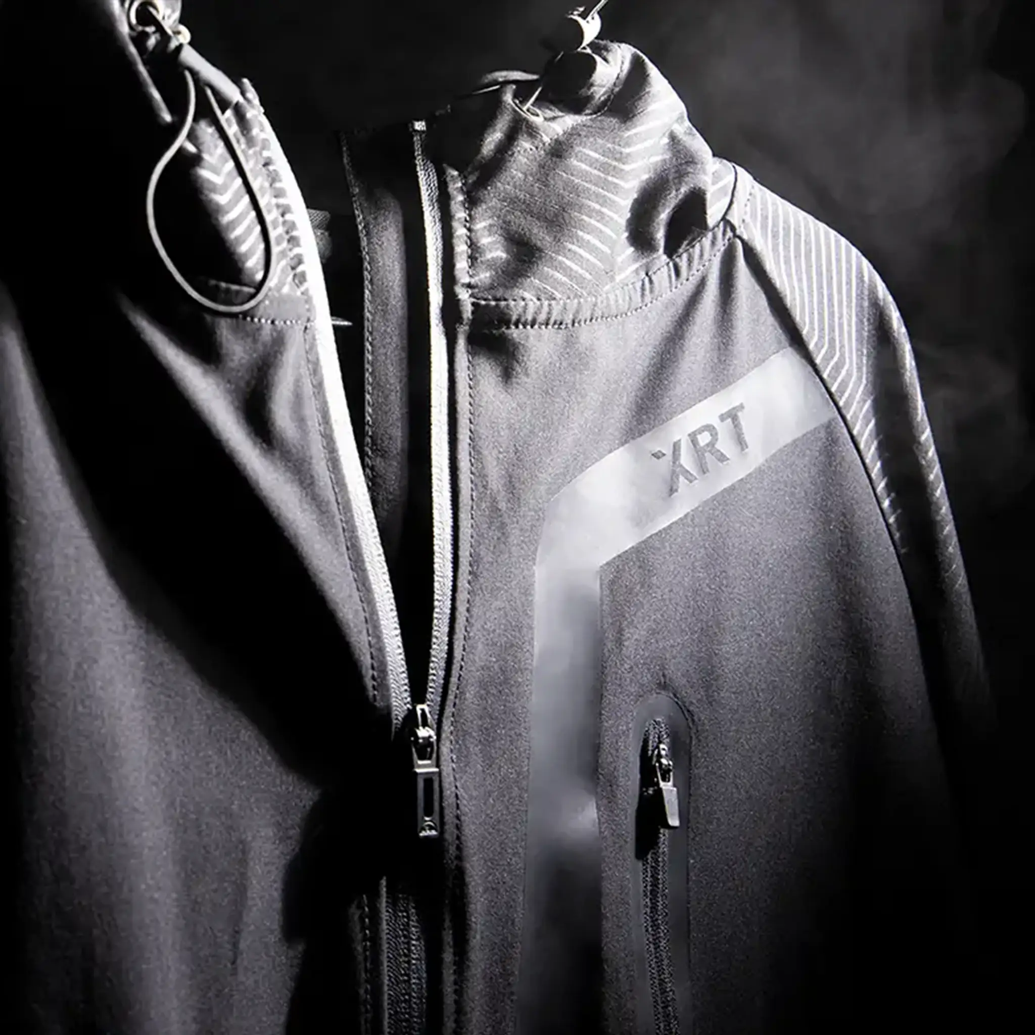 black sports jacket captured during a product photography session