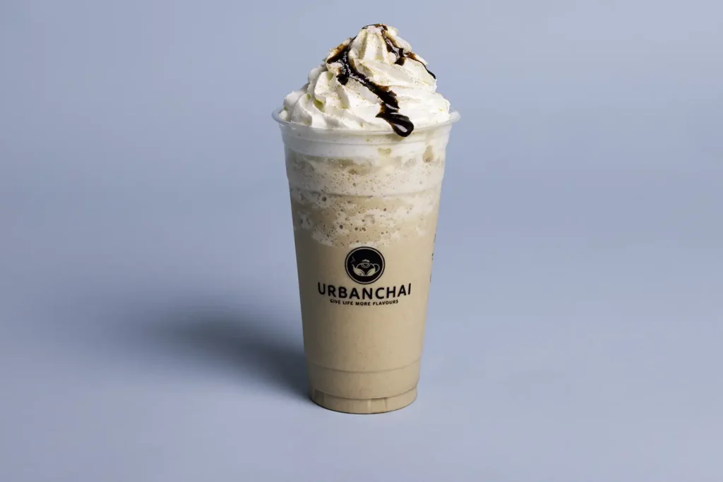 iced coffee topped with cream and chocolate in food photography