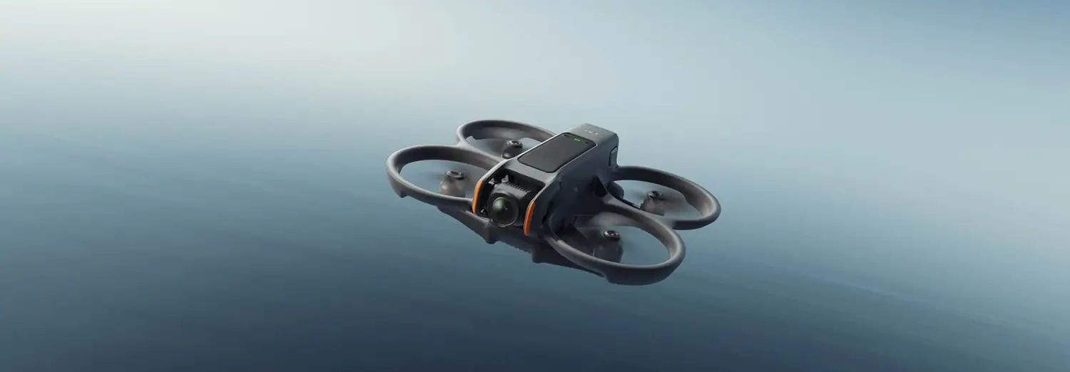 drone photography of compact drone hovering above water surface