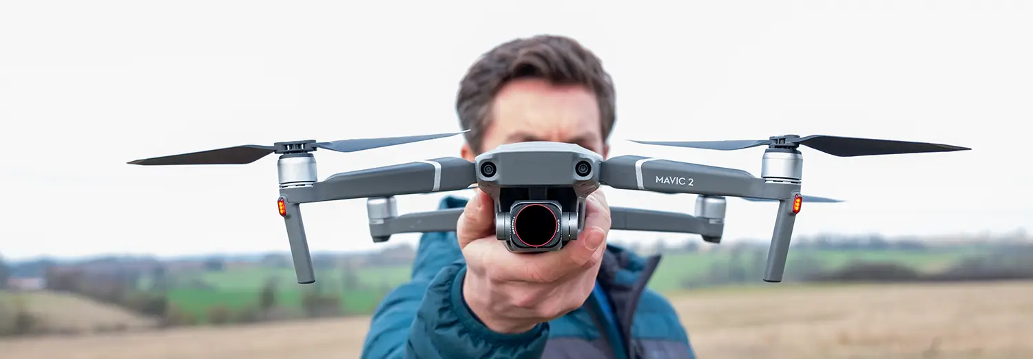 man holding professional drone ready for aerial photography